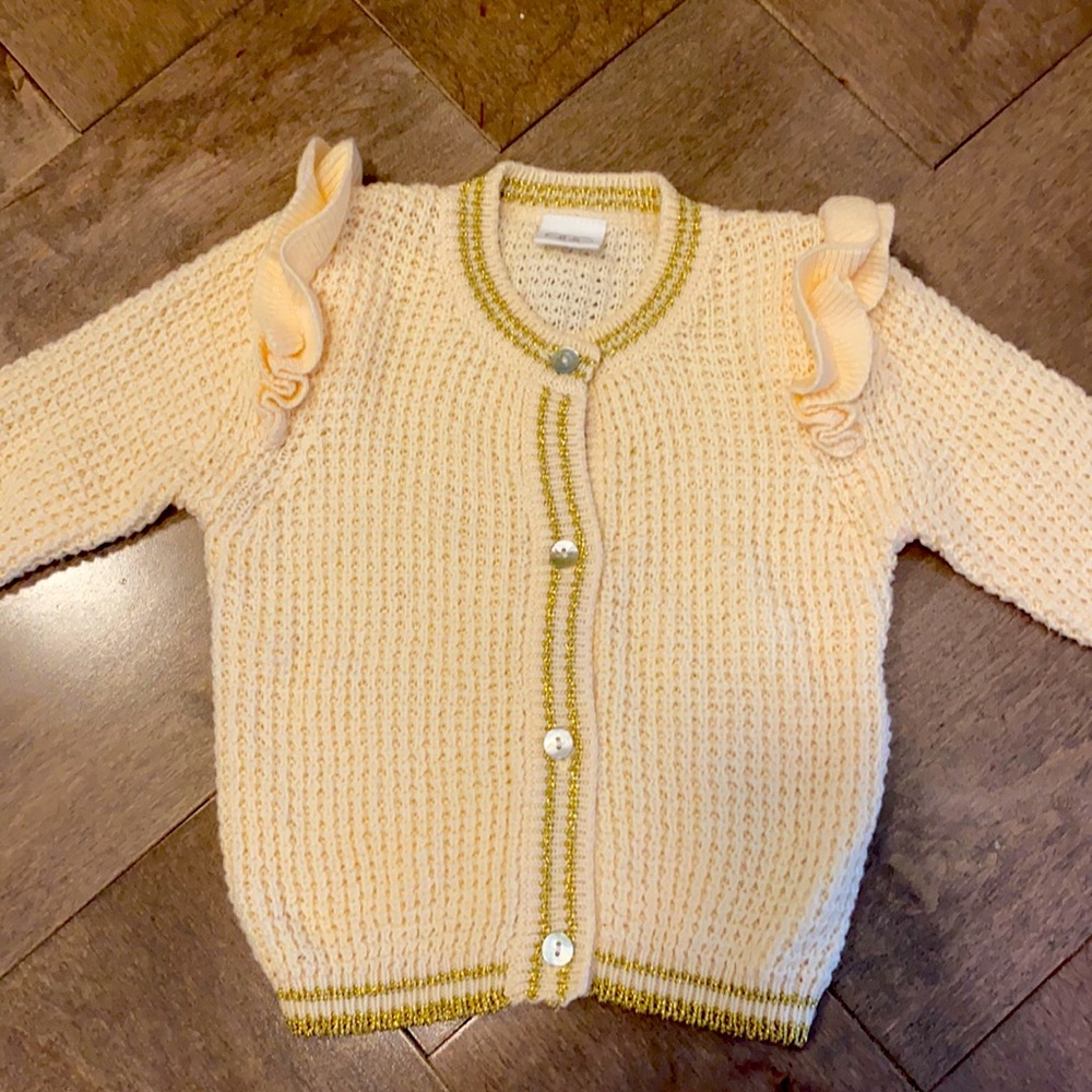 Cream and gold infant sweater